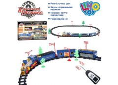 залізниця р/к, паровоз 19см., 3 вагони, муз., світло, на бат. в кор. 53х32х7см. ...